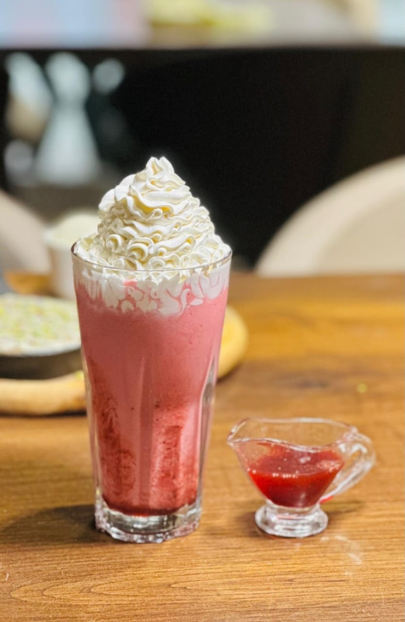 Strawberry milkshake with cream